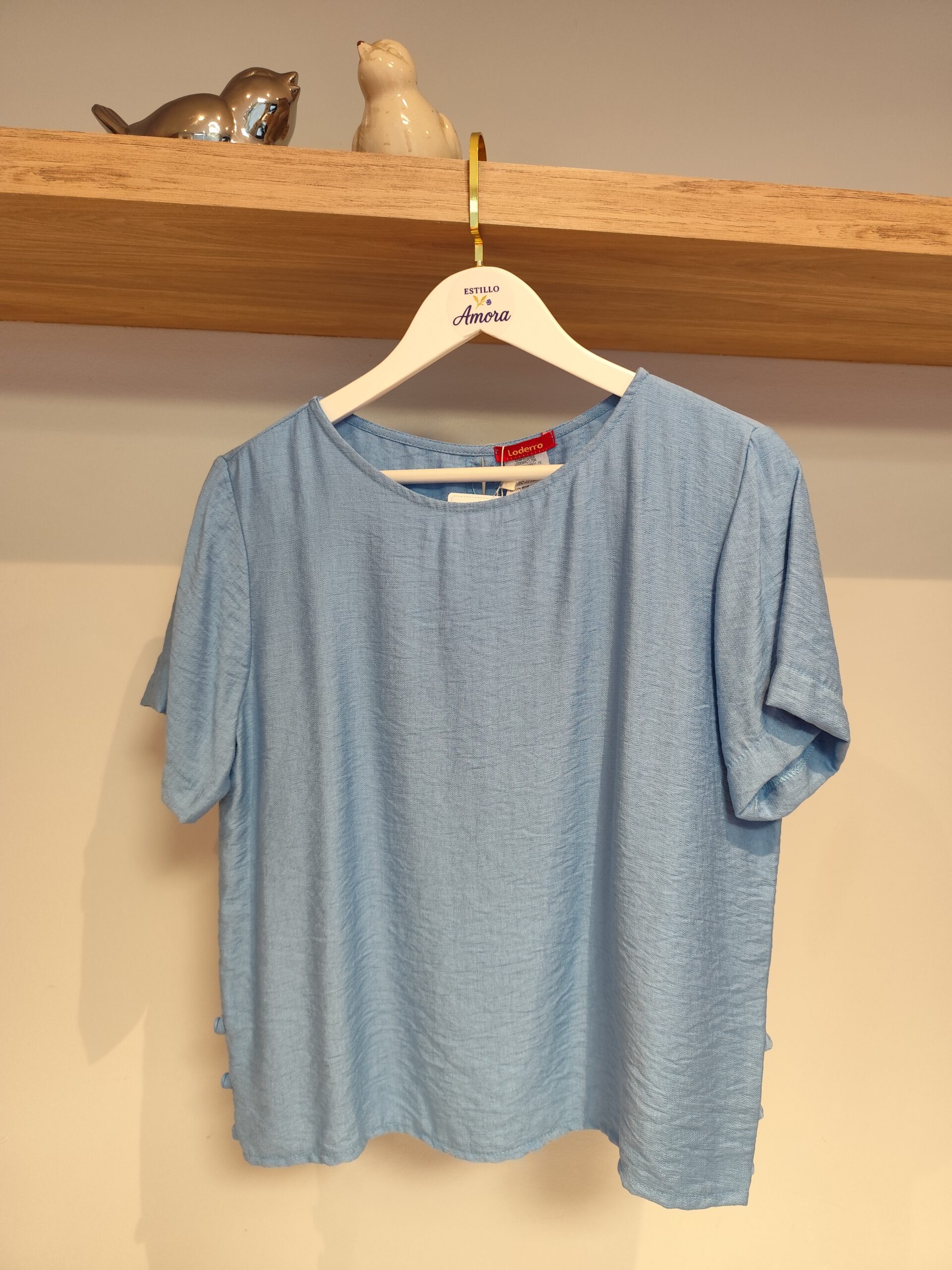 Blusa azul botões laterais